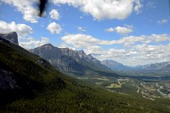 13 Canmore, Ha Ling Peak, Mount Rundle, Cascade Mountain As Helicopter From Lake Magog Prepares To Land In Canmore.jpg